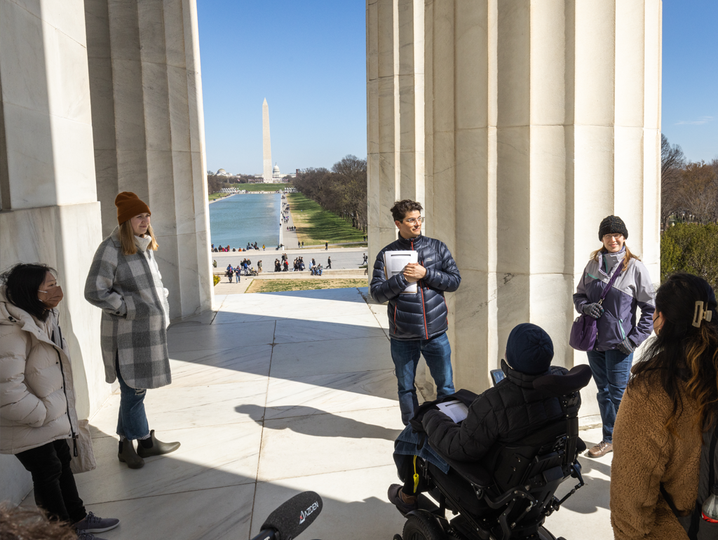 Group of students and professor at Lincoln Memorial